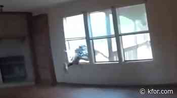 VIDEO: Man smashes through window running from Oklahoma County deputy