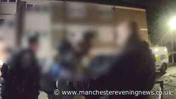 Moment suspect placed in cuffs after reports of attempts to open car doors in Bolton