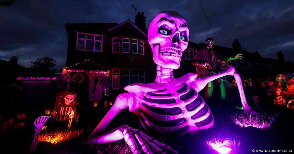 Incredible images of Prenton Halloween house including giant skeleton on the lawn