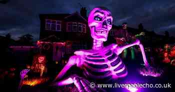 Incredible images of Prenton Halloween house including giant skeleton on the lawn
