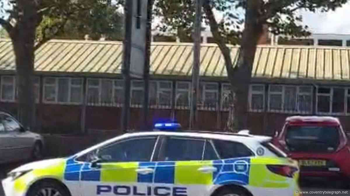 Man involved in standoff on roof of Coventry building arrested for 'assault'