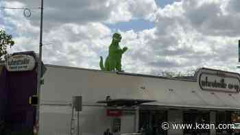 As Wheatsville's Guadalupe location closes, what happens to its rooftop dinosaur?