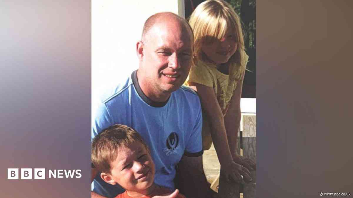 Head teacher dragged to his death under car, murder trial told