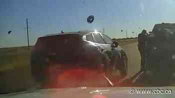 Video shows close call between RCMP officer and SUV during highway traffic stop