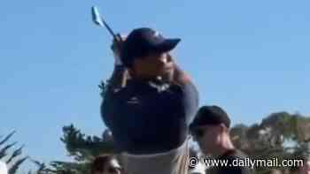 Tiger Woods, 50, fuels talk of a comeback as he's seen in action in rare public appearance after horror DUI car crash