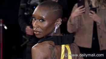 Cynthia Erivo stuns in a backless yellow gown at London Film Festival premiere of Prima Facie as movie is branded a 'finger-wagging lecture' in lukewarm reviews