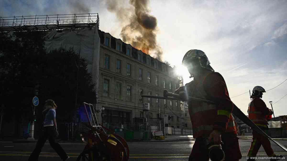 Firefighters battle huge blaze near Paris train station as smoke covers city