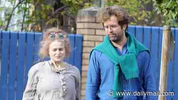 Helena Bonham Carter, 60, and her 'old-soul' lover Rye Dag Holmboe, 38, walk their dogs as they enjoy a romantic stroll
