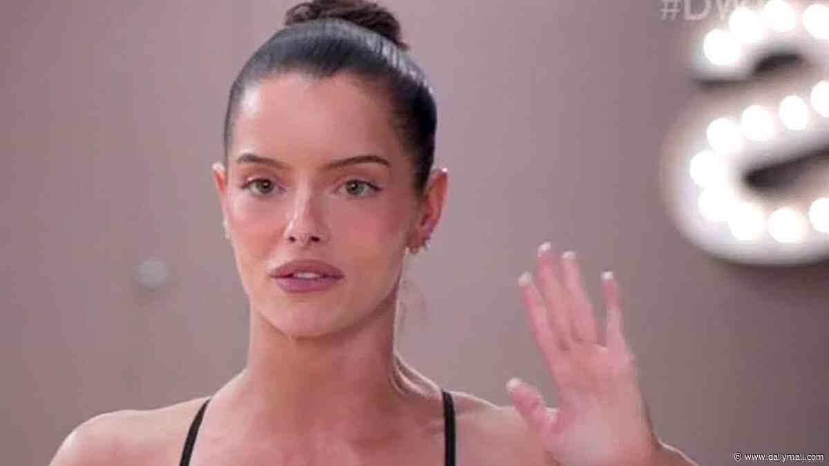 Maura Higgins writhes on the floor in agony as medics treat her for a painful neck injury during DWTS rehearsals