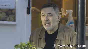 David Walliams looks ashen on a coffee date with a female friend as he is seen for the first time since being 'cancelled' over 'inappropriate behaviour towards women'