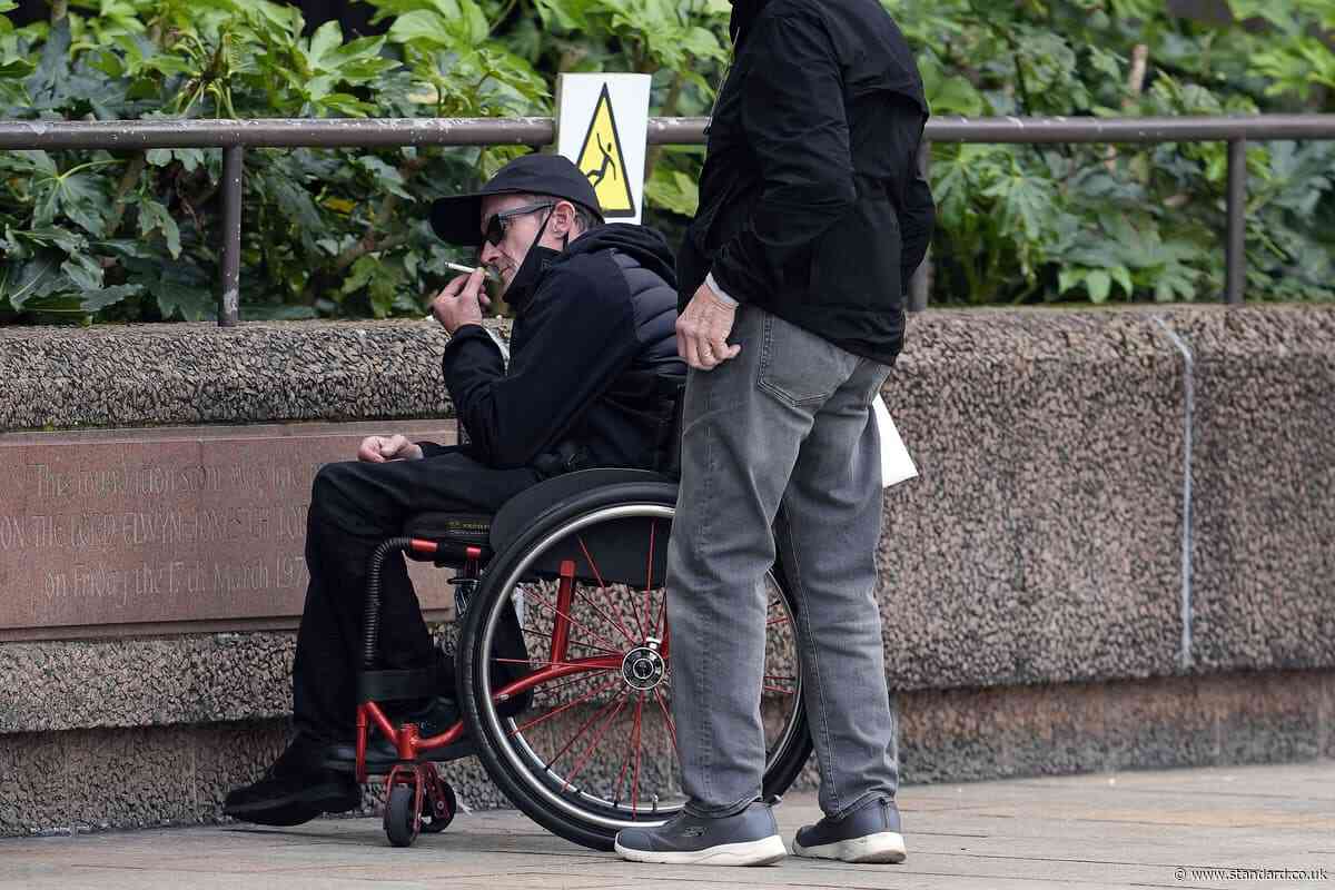 Liverpool fan accused of racial abuse taken to hospital during trial