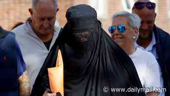 Anti-migrant protester arrives at court in burqa after he was charged with  breaching face-covering ban by wearing full Islamic dress to Portsmouth demo