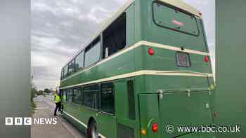 Boy, 14, falls from double decker bus window