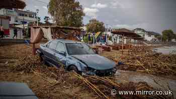 Man, 62, dies after torrential floods sweep car onto beach on Greek island of Rhodes