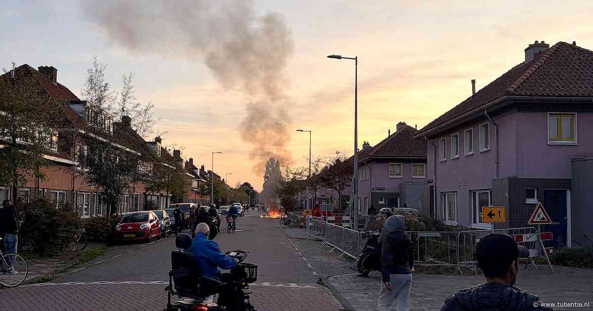 Drie mensen aangehouden na rellen en brandstichting in Amsterdam-Noord