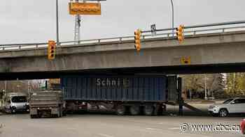 Stuck truck: Another semi strikes overpass in Saskatoon