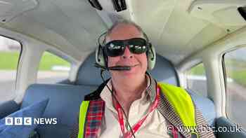 Visually impaired man at ease flying a plane