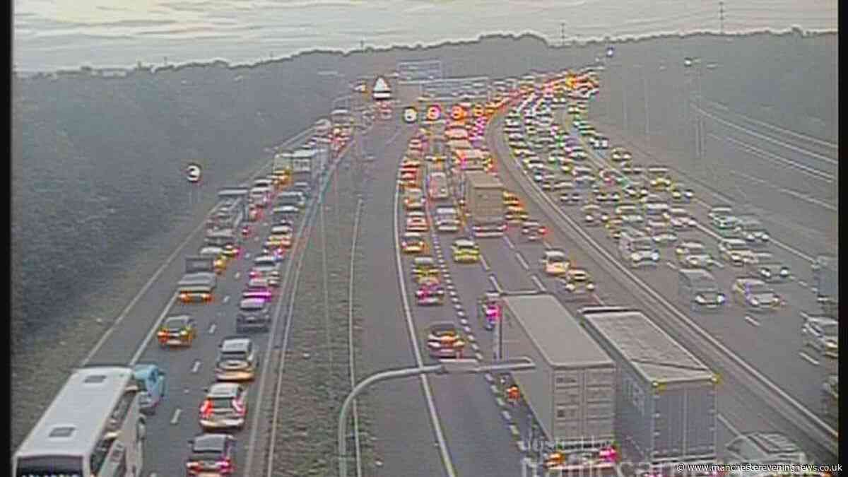 M60 traffic LIVE as drivers face huge delays after motorway shut for police incident