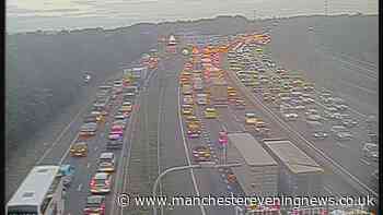 M60 traffic LIVE as drivers face huge delays after motorway shut for police incident