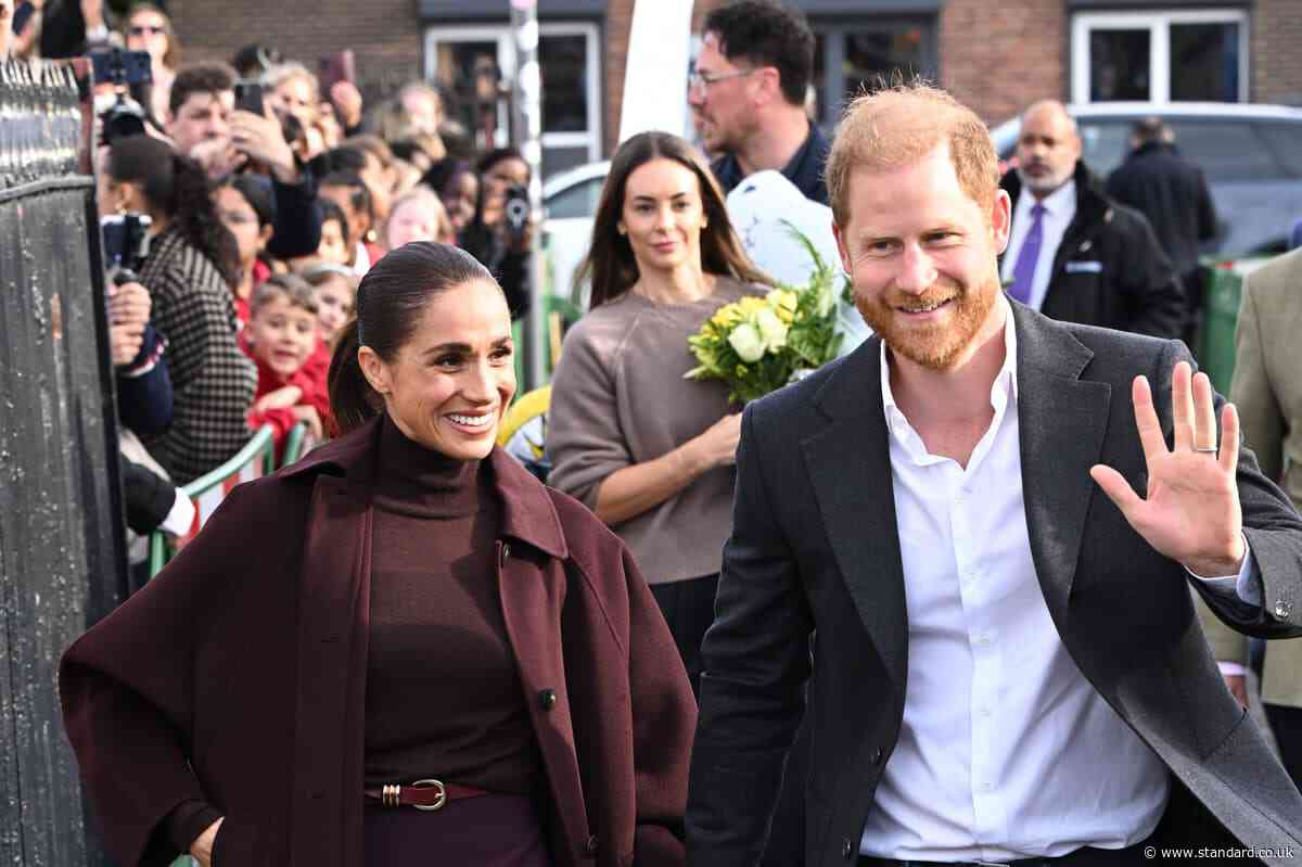 Harry and Meghan give hugs and selfies on first joint engagement since UK return