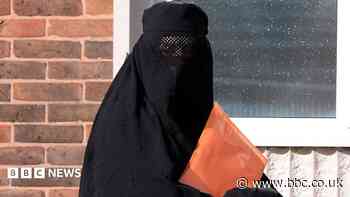 Protester wears burqa to deny concealing identity