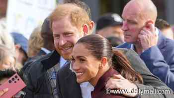 Meghan tells fans 'it's wonderful to be back' as she and Harry make their first joint public appearance since returning to UK