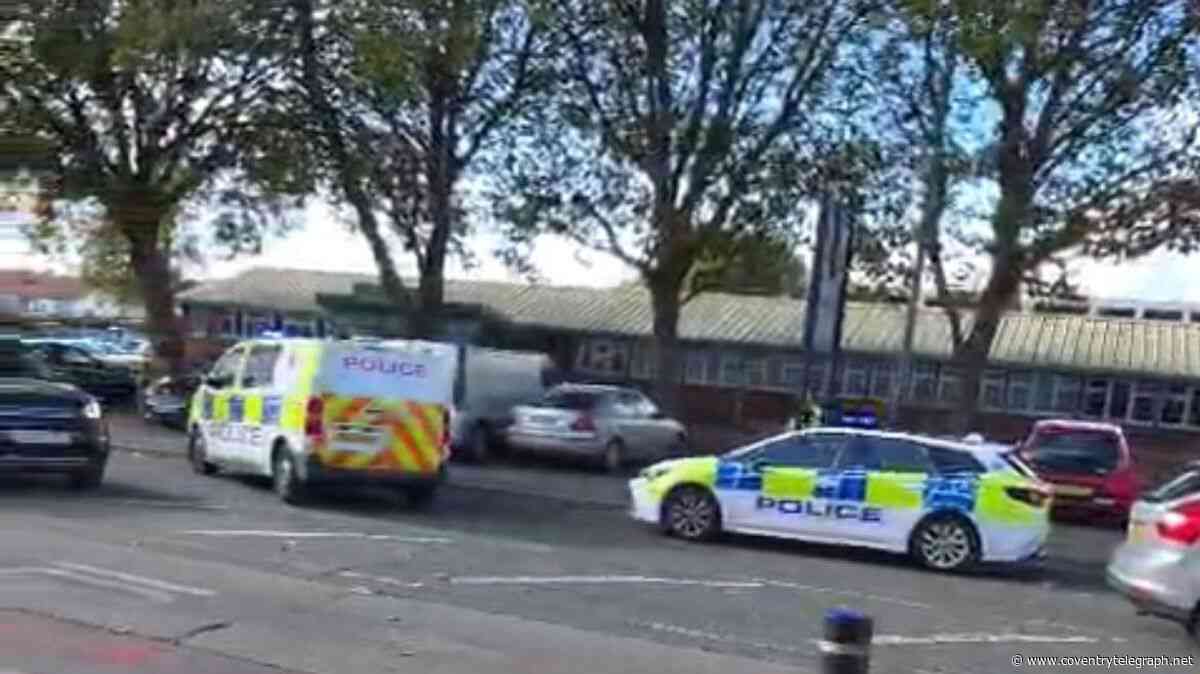 Man charged after 'brandishing weapons on roof of Coventry building'