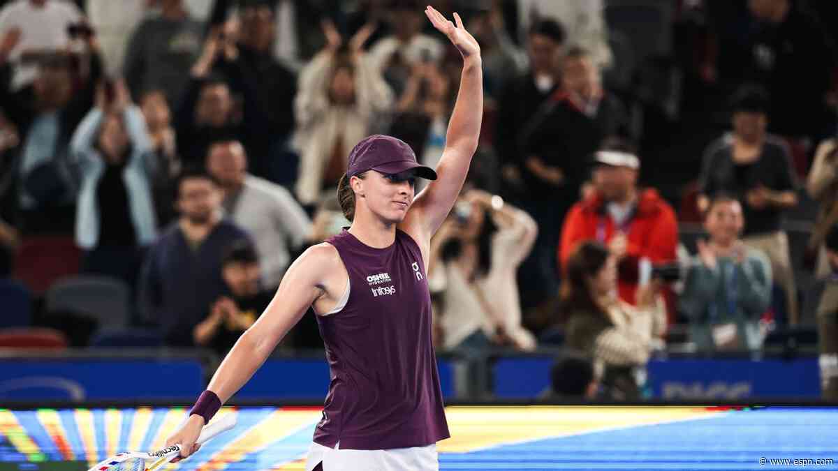 Swiatek advances at Wuhan Open to boost WTA Finals bid