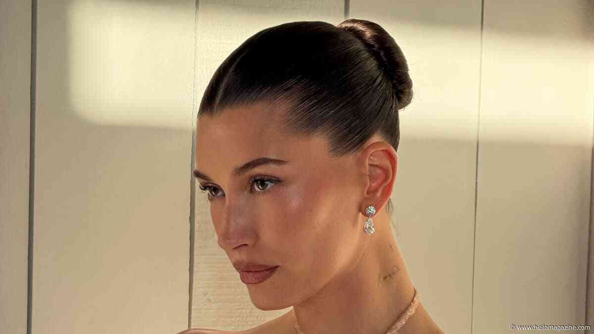 Hailey Bieber shows off ultra-toned figure in glitzy gold mini dress with must-see photos