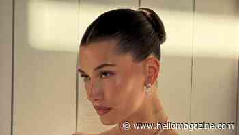 Hailey Bieber shows off ultra-toned figure in glitzy gold mini dress with must-see photos