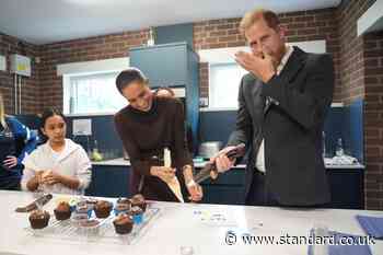 Royal icing proves beyond Harry’s talents as he and Meghan take on cupcakes task