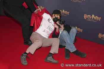 Trans rights activists rush carpet before Harry Potter And The Cursed Child show
