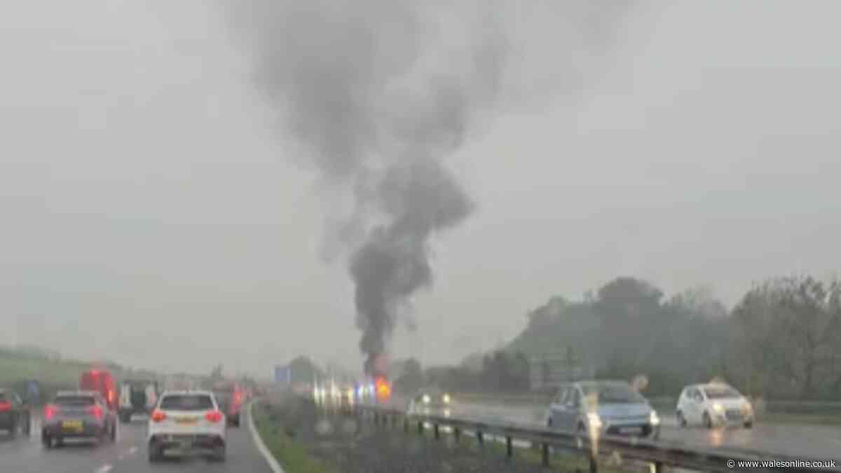 Car burst into flames bringing M4 to a standstill