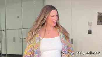 Pregnant Hilary Swank, 52, reveals her growing bump for the first time... hours after revealing baby joy