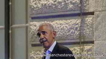 Former US president Barack Obama spotted striding out of swanky Manchester city centre hotel