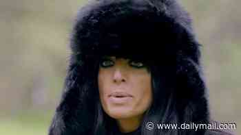 Celebrity Traitors fans are left in hysterics over Claudia Winkleman's bizarre 'Chewbacca' outfit as she sports a huge faux fur coat and hat for 'death parade' mission