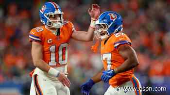 Follow live: Holani fights off Broncos defender on TD as Seahawks cut deficit
