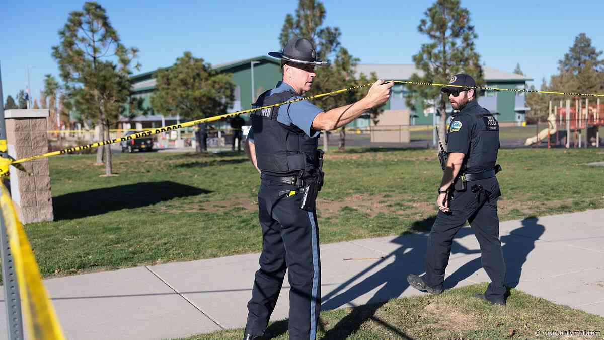 Oregon gunman fired shotgun at pickup truck before storming into school and killing three children ages 5, 8 and 11 and teacher