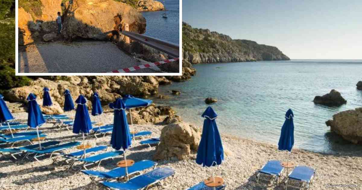 Toeristen uren vast op bekend strand op Rhodos nadat gevallen rotsblok toegangsweg blokkeert