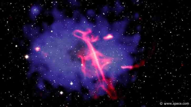 Supermassive black hole blasts out a neon 'treble clef' | Space photo of the day for Oct. 16, 2026