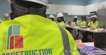 Students learning skills in free construction industry training course