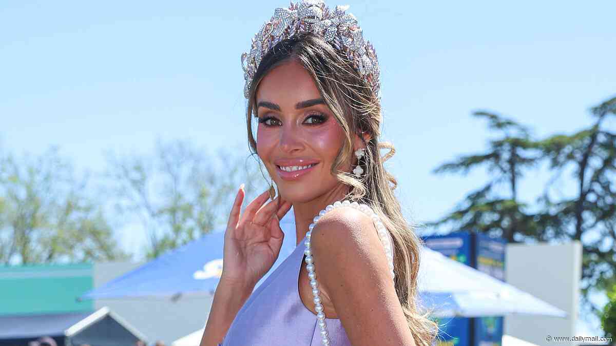 Barbie goes to the races! Zana Pali turns heads in bubble gum-coloured ensemble and giant pearl handbag as Melbourne's finest get all dolled up for the Caulfield Cup