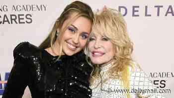 Miley Cyrus brings sold-out LA concert to a standstill as she breaks down in tears paying tribute to late godmother Dolly Parton: 'Me and Dolly, we are eternal'