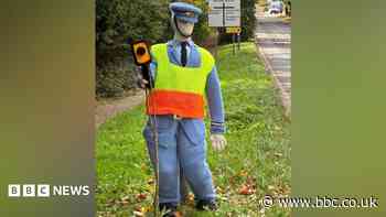 Village creates knitted traffic officer to 'fool drivers'