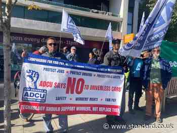 Uber drivers fear job losses as protesters rally against London's robotaxi rollout