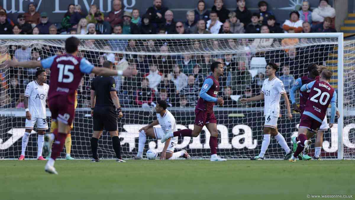Swansea City stay top despite narrow defeat to West Ham United