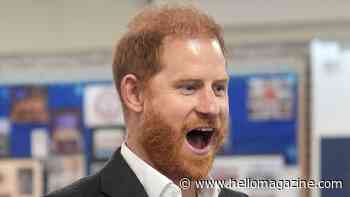 Prince Harry caught on camera fondling fellow redhead's bushy ginger beard