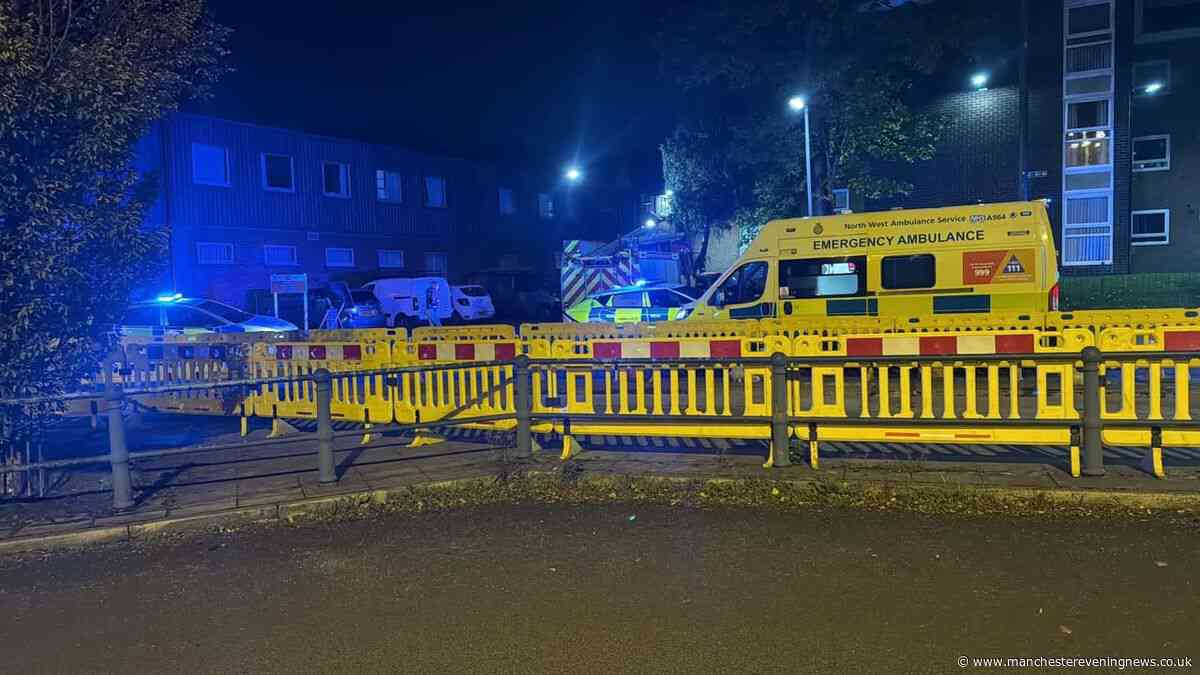 Emergency services storm Prestwich street as fire breaks out near Metrolink station