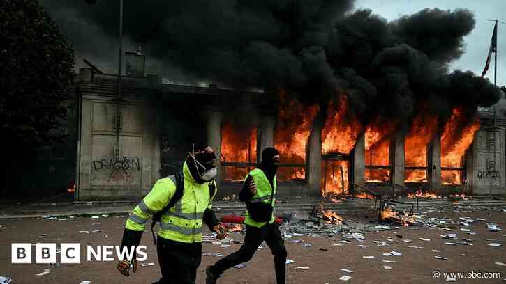Violent clashes, looting and buildings ablaze as hundreds arrested in France protests
