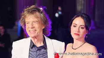 Mick Jagger's 39-year-old fiancee steals the show in slinky gold gown alongside rocker, 83